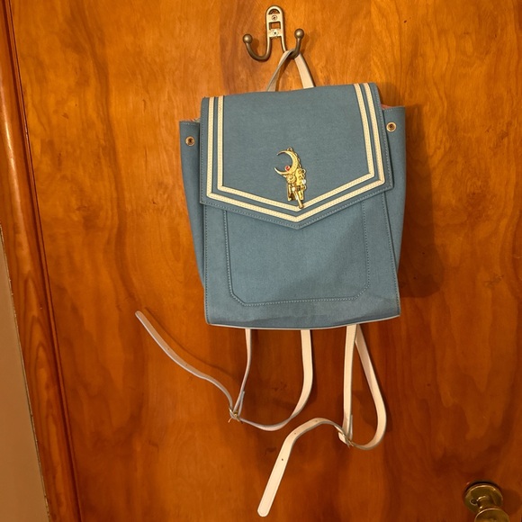 Stylish Blue Backpack with White Accents - Picture 1 of 5